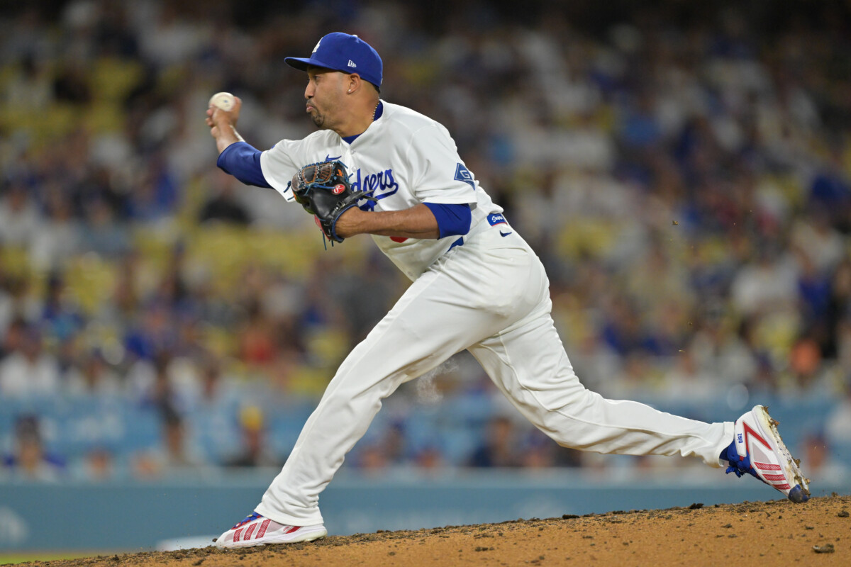 Aug 13, 2026; Los Angeles, California, USA; Los Angeles Dodgers relief pitcher Edwin Diaz (3) delivers to the plate in the ninth inning against the Milwaukee Brewers at Dodger Stadium. Mandatory Credit: Jayne Kamin-Oncea-Imagn Images