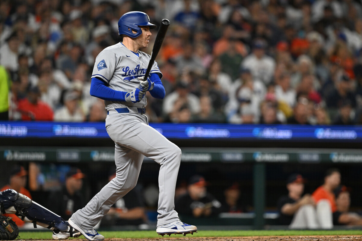 Aug 28, 2026; Detroit, Michigan, USA; Los Angeles Dodgers first baseman Freddie Freeman (5) singles in a run against the Detroit Tigers in the eighth inning at Comerica Park. Mandatory Credit: Lon Horwedel-Imagn Images