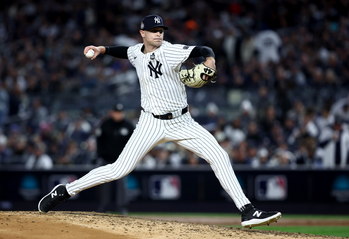 Oct 28, 2024; New York, New York, USA; New York Yankees pitcher Jake Cousins (61) throws during the sixth inning against the Los Angeles Dodgers in game three of the 2024 MLB World Series at Yankee Stadium. Mandatory Credit: Wendell Cruz-Imagn Images