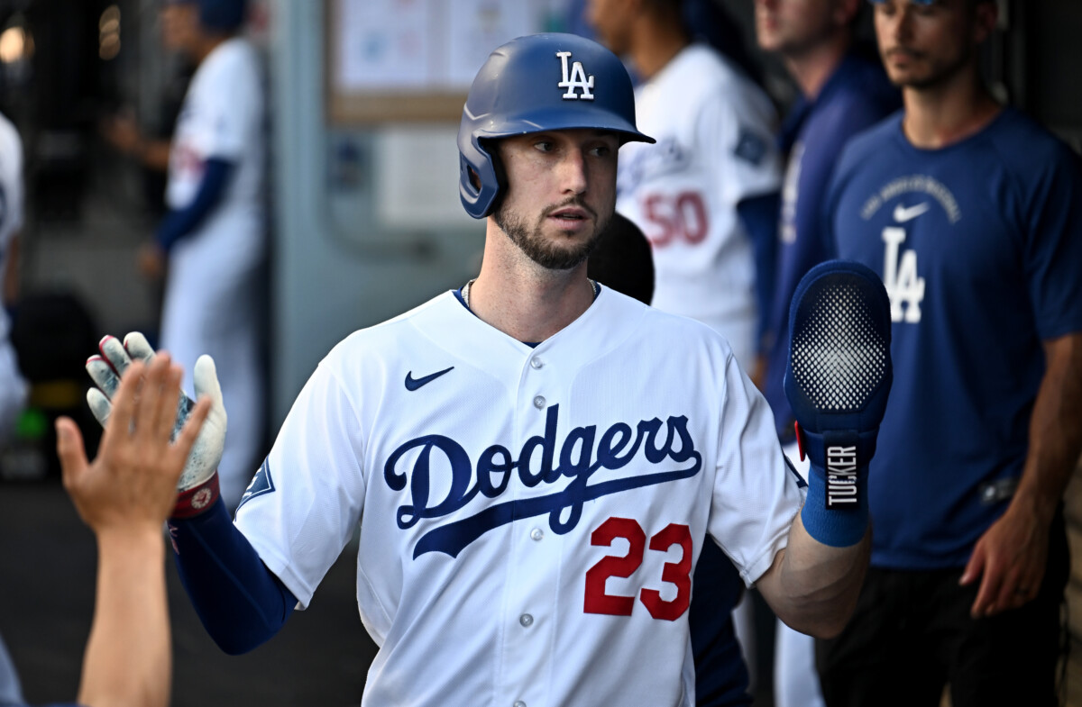 Aug 2, 2026; Los Angeles, California, USA; Los Angeles Dodgers right fielder Kyle Tucker (23) celebrates with teammates after scoring during the second inning against the Boston Red Sox at Dodger Stadium. Mandatory Credit: Jonathan Hui-Imagn Images