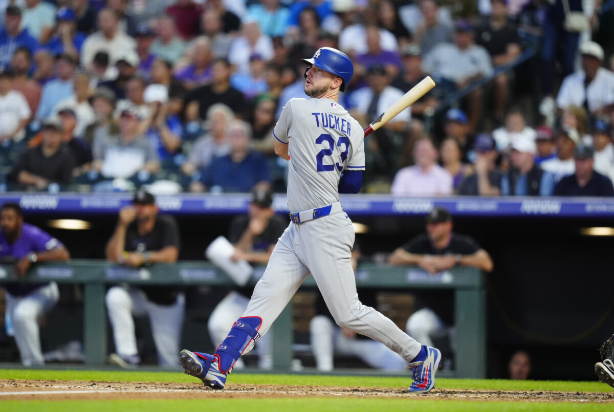 Aug 19, 2026; Denver, Colorado, USA; Los Angeles Dodgers right fielder Kyle Tucker (23) singles in the fourth inning against the Colorado Rockies at Coors Field. Mandatory Credit: Ron Chenoy-Imagn Images