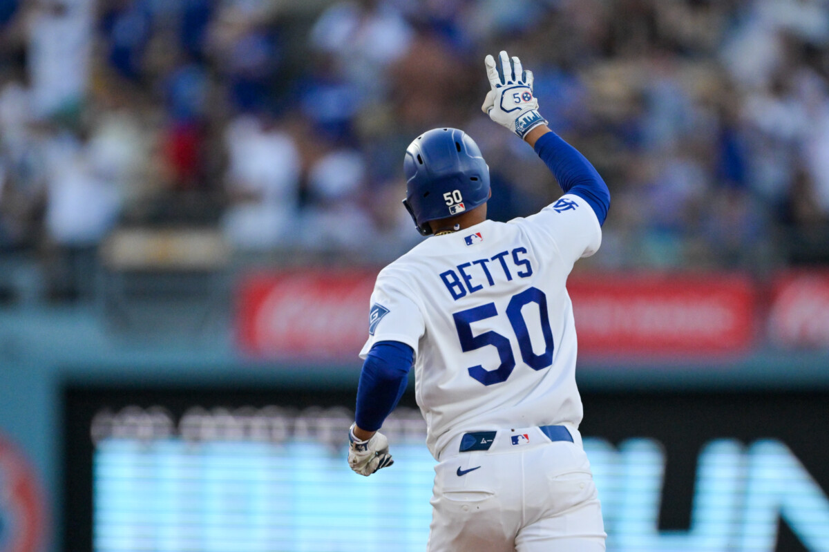 Aug 11, 2026; Los Angeles, California, USA; Los Angeles Dodgers shortstop Mookie Betts (50) reacts after a solo home run in the second inning against the Kansas City Royals at Dodger Stadium. Mandatory Credit: Jayne Kamin-Oncea-Imagn Images