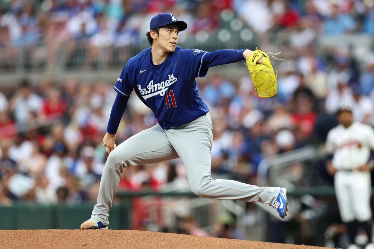 Aug 26, 2026; Cumberland, Georgia, USA; Los Angeles Dodgers starting pitcher Roki Sasaki (11) throws against the Atlanta Braves in the first inning at Truist Park. Mandatory Credit: Colin Hubbard-Imagn Images