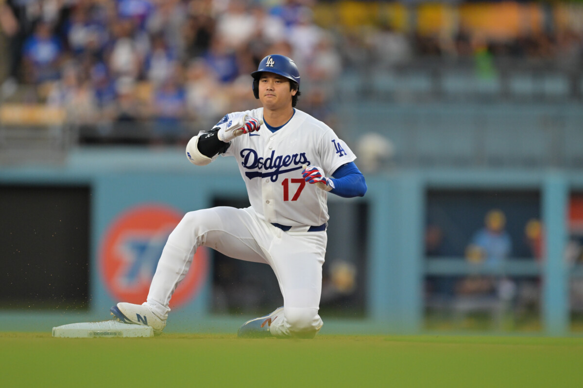 Aug 13, 2026; Los Angeles, California, USA; Los Angeles Dodgers designated hitter Shohei Ohtani (17) slides into second base after hitting a double during the first inning against the Milwaukee Brewers at Dodger Stadium. Mandatory Credit: Jayne Kamin-Oncea-Imagn Images