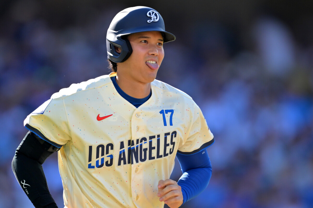 Aug 22, 2026; Los Angeles, California, USA; Los Angeles Dodgers designated hitter player Shohei Ohtani (17) jogs to first after a walk in the third inning against the Pittsburgh Pirates at Dodger Stadium. Mandatory Credit: Jayne Kamin-Oncea-Imagn Images