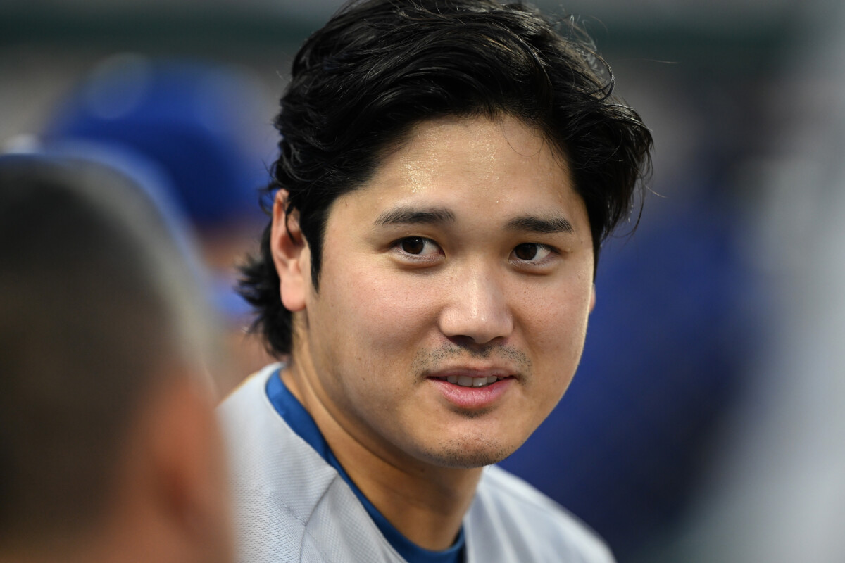 Aug 28, 2026; Detroit, Michigan, USA; Los Angeles Dodgers designated hitter Shohei Ohtani (17) talks with the team trainer in the dugout against the Detroit Tigers in the fifth inning at Comerica Park. Mandatory Credit: Lon Horwedel-Imagn Images