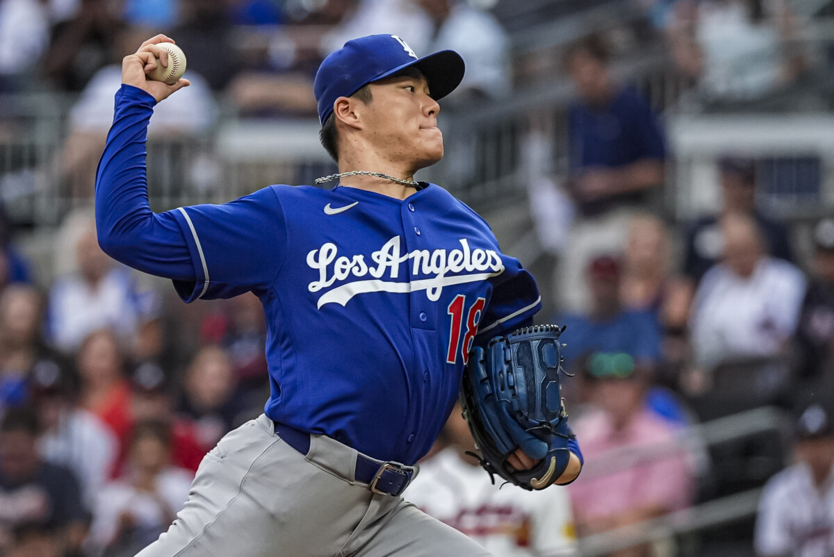 Aug 27, 2026; Cumberland, Georgia, USA; Los Angeles Dodgers pitcher Yoshinobu Yamamoto (18) pitches against the Atlanta Braves during the first inning at Truist Park. Mandatory Credit: Dale Zanine-Imagn Images