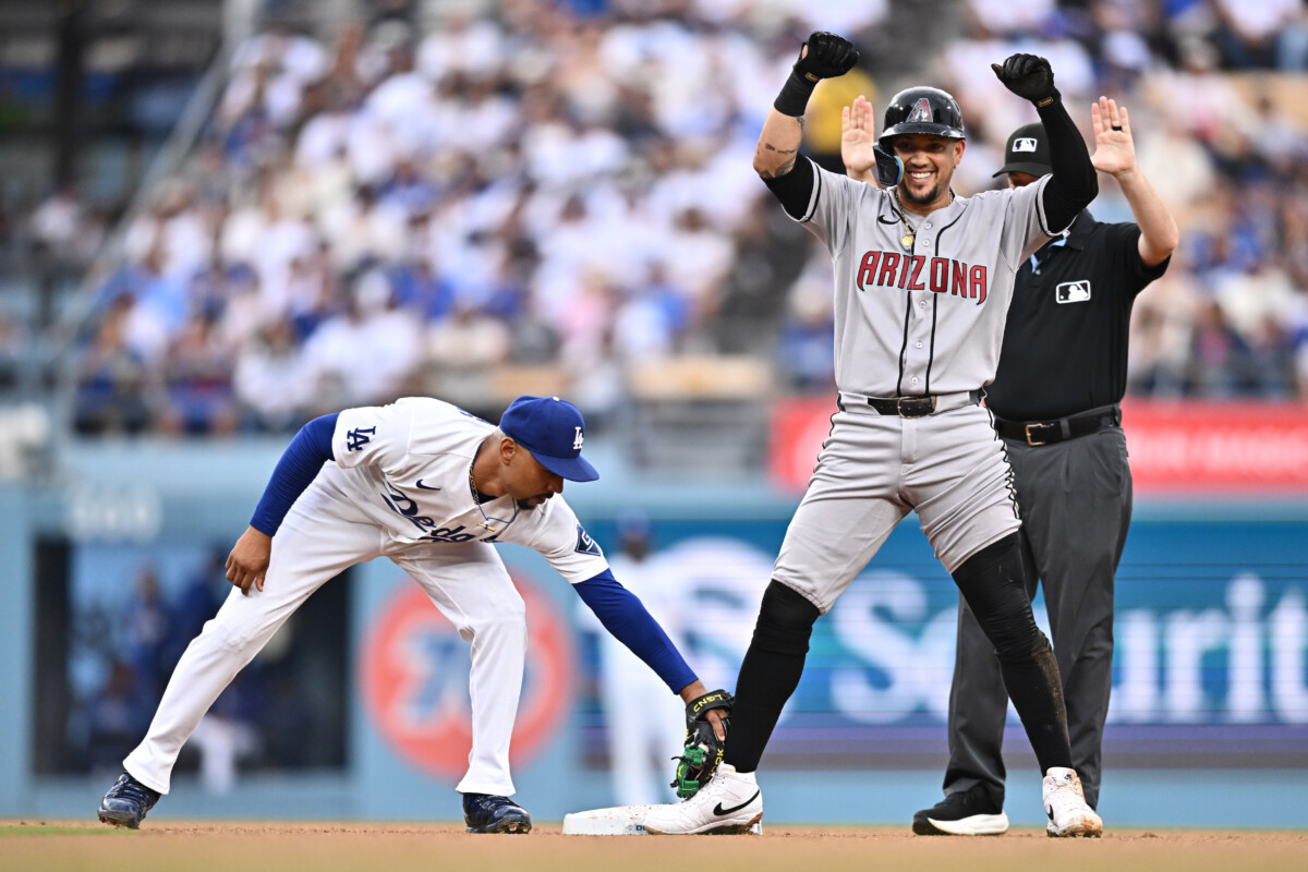 Jul 12, 2026; Los Angeles, California, USA; Arizona Diamondbacks second baseman Ildemaro Vargas (6) gestures after hitting a double during the fifth inning against the Los Angeles Dodgers at Dodger Stadium. Mandatory Credit: William Liang-Imagn Images
