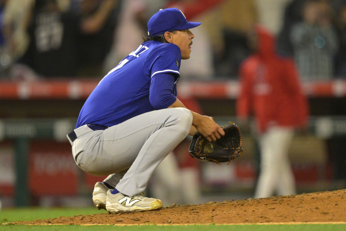 Mar 24, 2025; Anaheim, California, USA; Los Angeles Dodgers relief pitcher Jose Rodriguez (97) reacts after giving up a walk-off single to Los Angeles Angels left fielder Taylor Ward (3) in the ninth inning at Angel Stadium. Mandatory Credit: Jayne Kamin-Oncea-Imagn Images