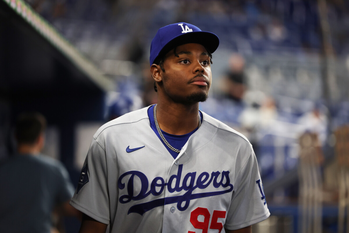 Sep 12, 2026; Miami, Florida, USA; Los Angeles Dodgers right fielder Josue de Paula (95) walks through the dugout before the Los Angeles Dodgers against the Miami Marlins at loanDepot Park. Mandatory Credit: Isabella Frias-Imagn Images