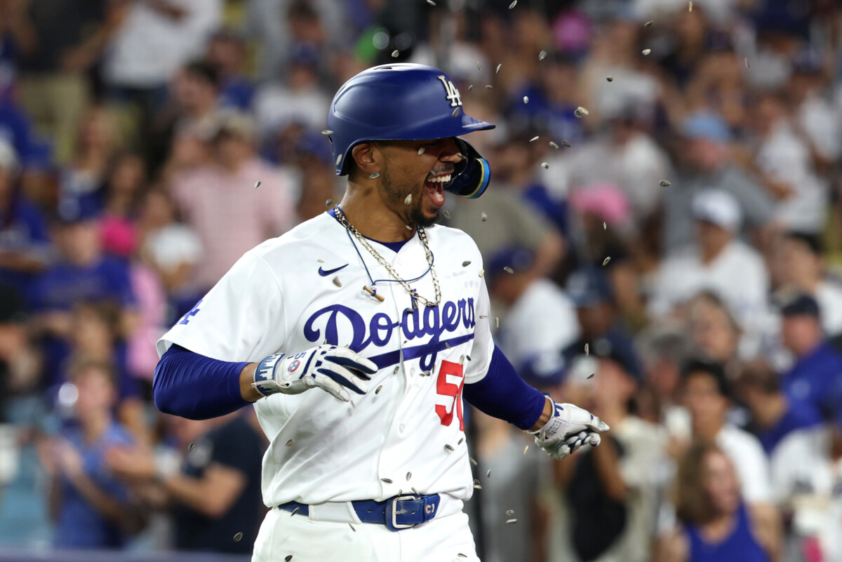 Sep 9, 2026; Los Angeles, California, USA; Los Angeles Dodgers shortstop Mookie Betts (50) celebrates after hitting a two run home run during the third inning against the Cincinnati Reds at Dodger Stadium. Mandatory Credit: Kiyoshi Mio-Imagn Images