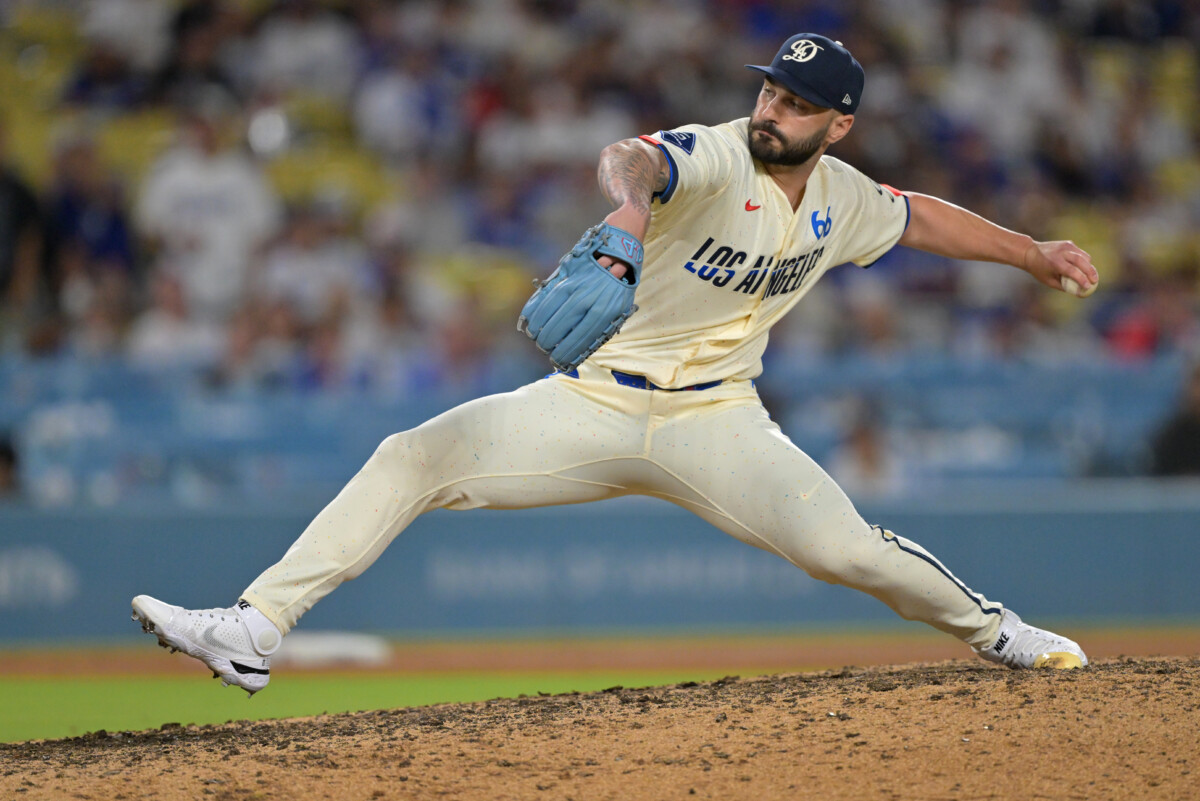Sep 5, 2026; Los Angeles, California, USA; Los Angeles Dodgers pitcher Tanner Scott (66) pitches against the Washington Nationals during the ninth inning at UNIQLO Field at Dodger Stadium. Mandatory Credit: Jayne Kamin-Oncea-Imagn Images