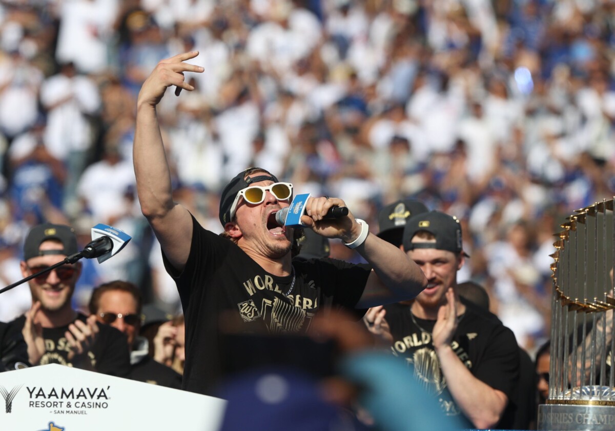 Dodgers player Kike Hernandez fires up crowd during the 2025 World Series championship celebration at Dodger Stadium in Los