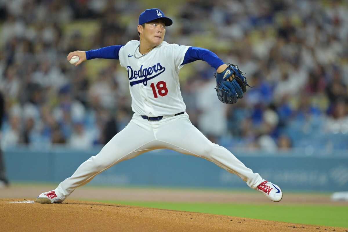 Sep 23, 2026; Los Angeles, California, USA; Los Angeles Dodgers pitcher Yoshinobu Yamamoto (18) delivers a pitch in the first inning against the San Diego Padres at Dodger Stadium. Mandatory Credit: Jayne Kamin-Oncea-Imagn Images