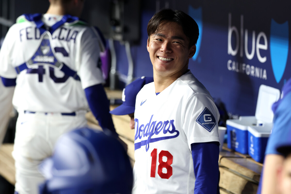Sep 9, 2026; Los Angeles, California, USA;  Los Angeles Dodgers pitcher Yoshinobu Yamamoto (18) looks on during the third inning against the Cincinnati Reds at Dodger Stadium.  Mandatory Credit: Kiyoshi Mio-Imagn Images