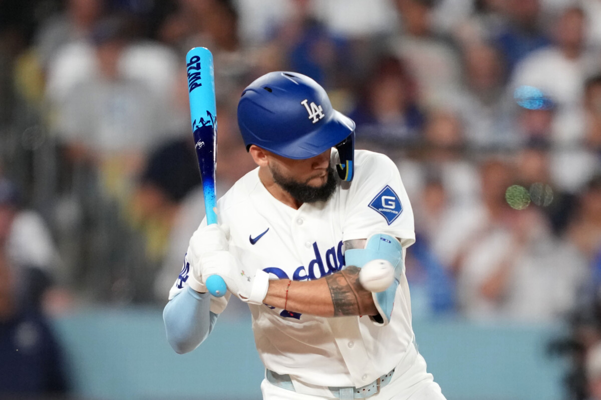 Aug 21, 2026; Los Angeles, California, USA; Los Angeles Dodgers center fielder Andy Pages (44) is hit by a pitch in the third inning against the Pittsburgh Pirates at Dodger Stadium. Mandatory Credit: Kirby Lee-Imagn Images