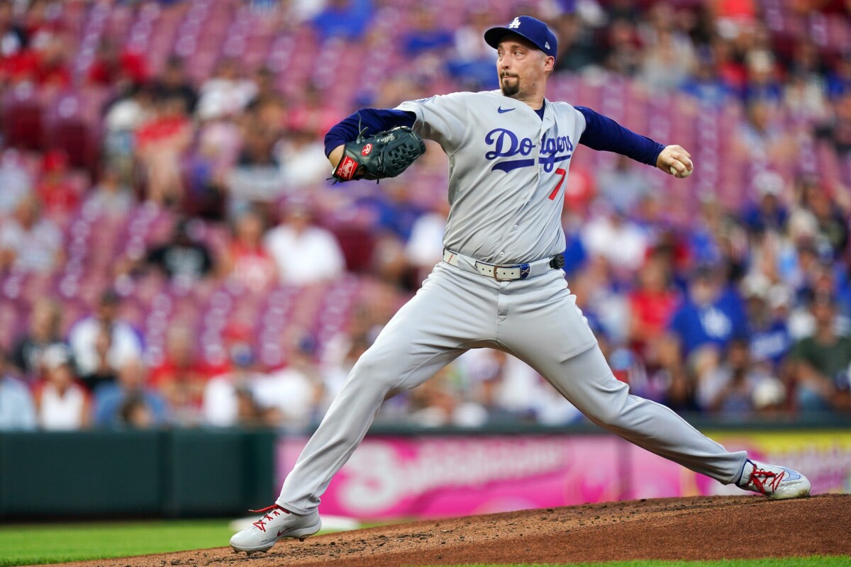 Sep 16, 2026; Cincinnati, Ohio, USA; Los Angeles Dodgers shortstop Mookie Betts (50) throws to first to get Cincinnati Reds outfielder Dane Myers (not pictured) out in the third inning at Great American Ball Park. Mandatory Credit: Katie Stratman-Imagn Images