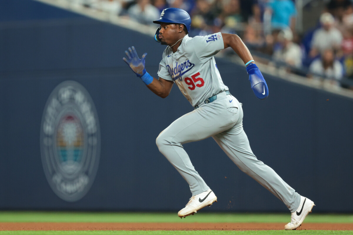 Sep 11, 2026; Miami, Florida, USA; Los Angeles Dodgers designated hitter Josue De Paula (95) runs toward second base during a steal attempt in the fourth inning against the Miami Marlins at loanDepot Park. Mandatory Credit: Sam Navarro-Imagn Images