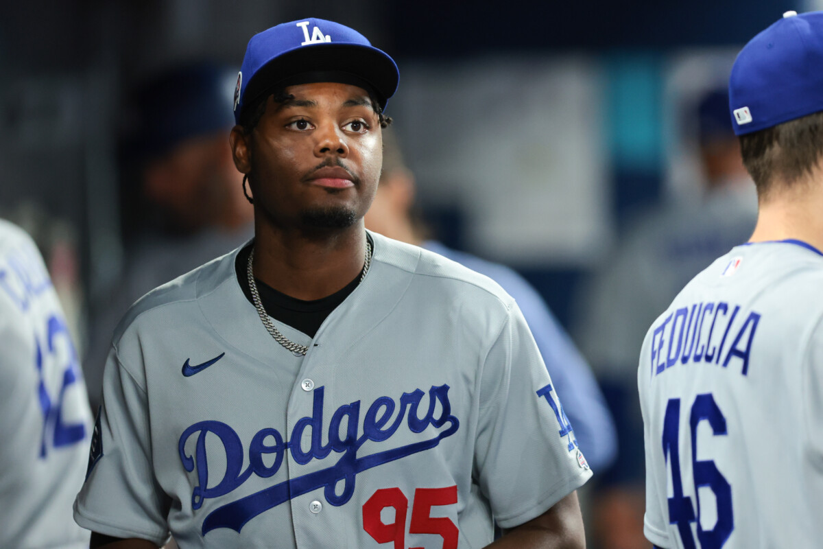 Sep 11, 2026; Miami, Florida, USA; Los Angeles Dodgers designated hitter Josue De Paula (95) looks on from inside the dugout before the game against the Miami Marlins at loanDepot Park. Mandatory Credit: Sam Navarro-Imagn Images