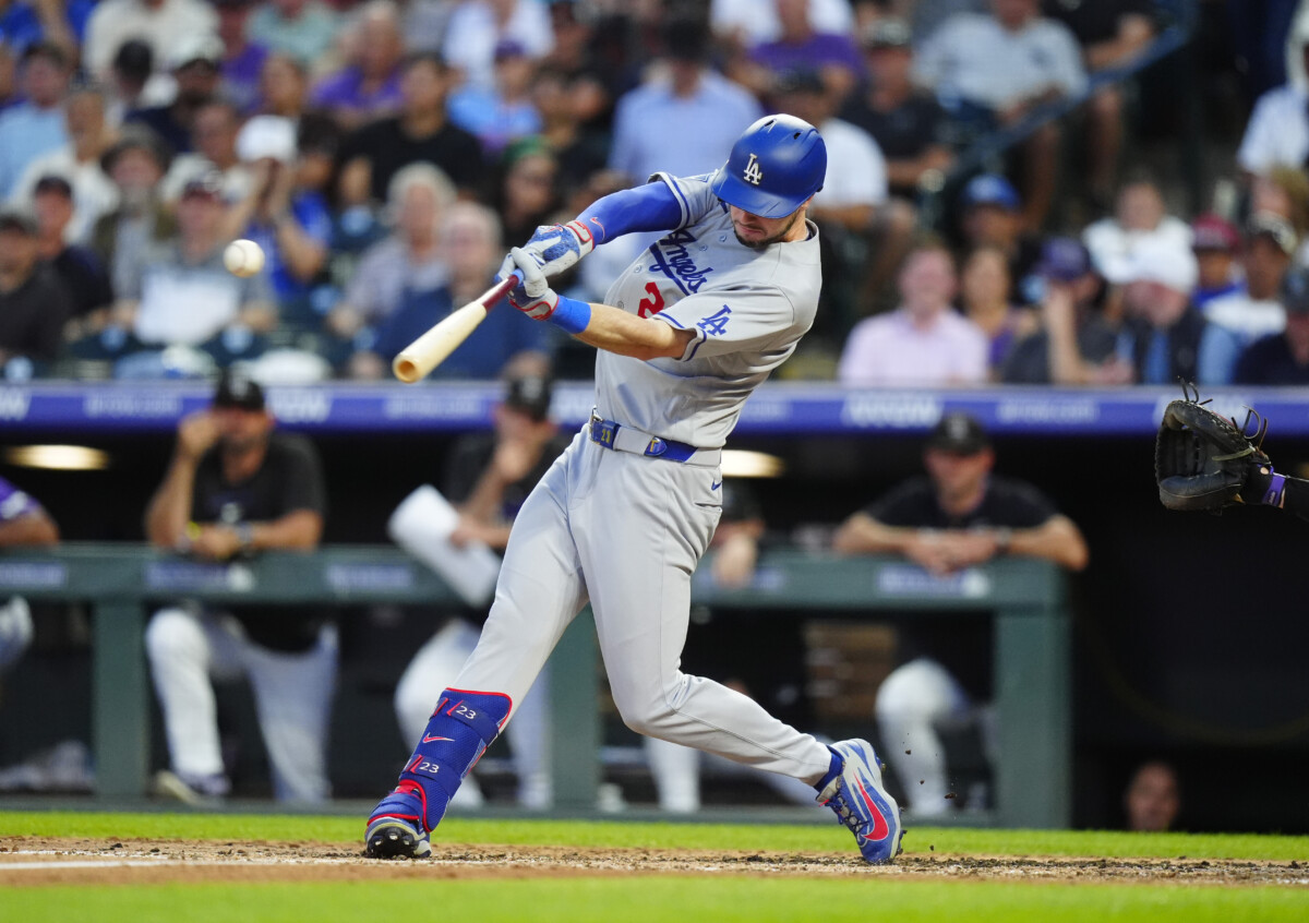 Aug 19, 2026; Denver, Colorado, USA; Los Angeles Dodgers right fielder Kyle Tucker (23) singles in the fourth inning against the Colorado Rockies at Coors Field. Mandatory Credit: Ron Chenoy-Imagn Images
