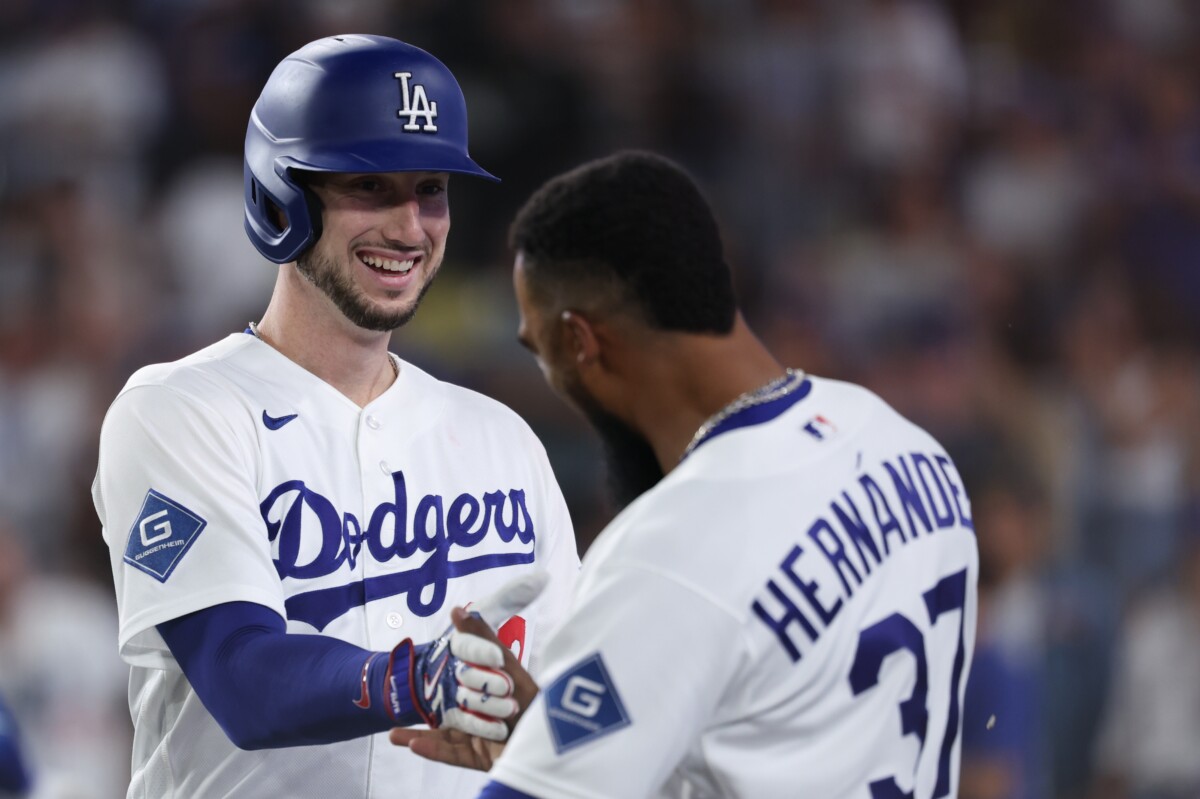 Sep 4, 2026; Los Angeles, California, USA; Los Angeles Dodgers outfielder Kyle Tucker (23) hits a home run and is greeted by outfielder Teoscar Hernandez (37) during the sixth inning against the Washington Nationals at UNIQLO Field at Dodger Stadium. Mandatory Credit: Kiyoshi Mio-Imagn Images