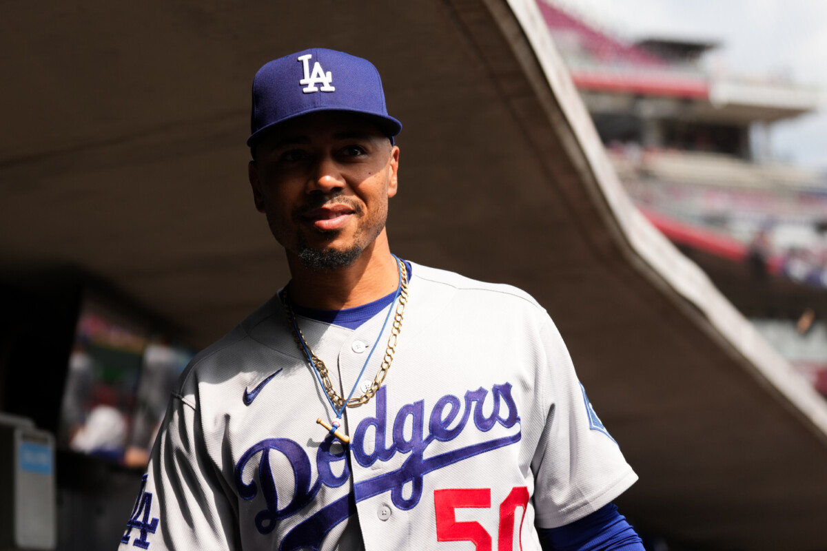 Sep 17, 2026; Cincinnati, Ohio, USA; Los Angeles Dodgers shortstop Mookie Betts (50) stands in the dugout during the game against the Cincinnati Reds in the eighth inning at Great American Ball Park. Mandatory Credit: Aaron Doster-Imagn Images