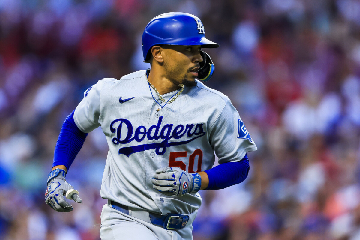 Sep 16, 2026; Cincinnati, Ohio, USA; Los Angeles Dodgers shortstop Mookie Betts (50) runs to first after hitting a single in the third inning against the Cincinnati Reds at Great American Ball Park. Mandatory Credit: Katie Stratman-Imagn Images