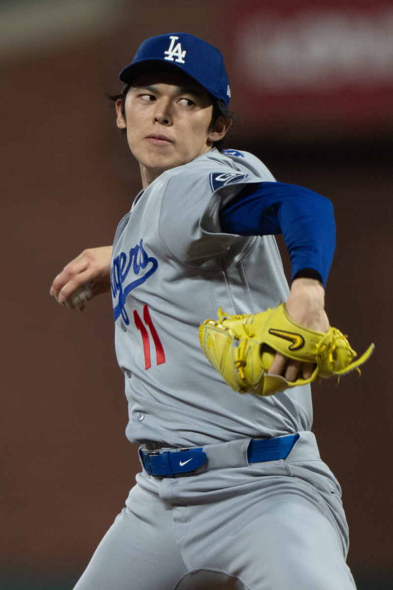 Sep 25, 2026; San Francisco, California, USA; Los Angeles Dodgers pitcher Roki Sasaki (11) pitches during the eighth inning against the San Francisco Giants at Oracle Park. Mandatory Credit: Stan Szeto-Imagn Images
