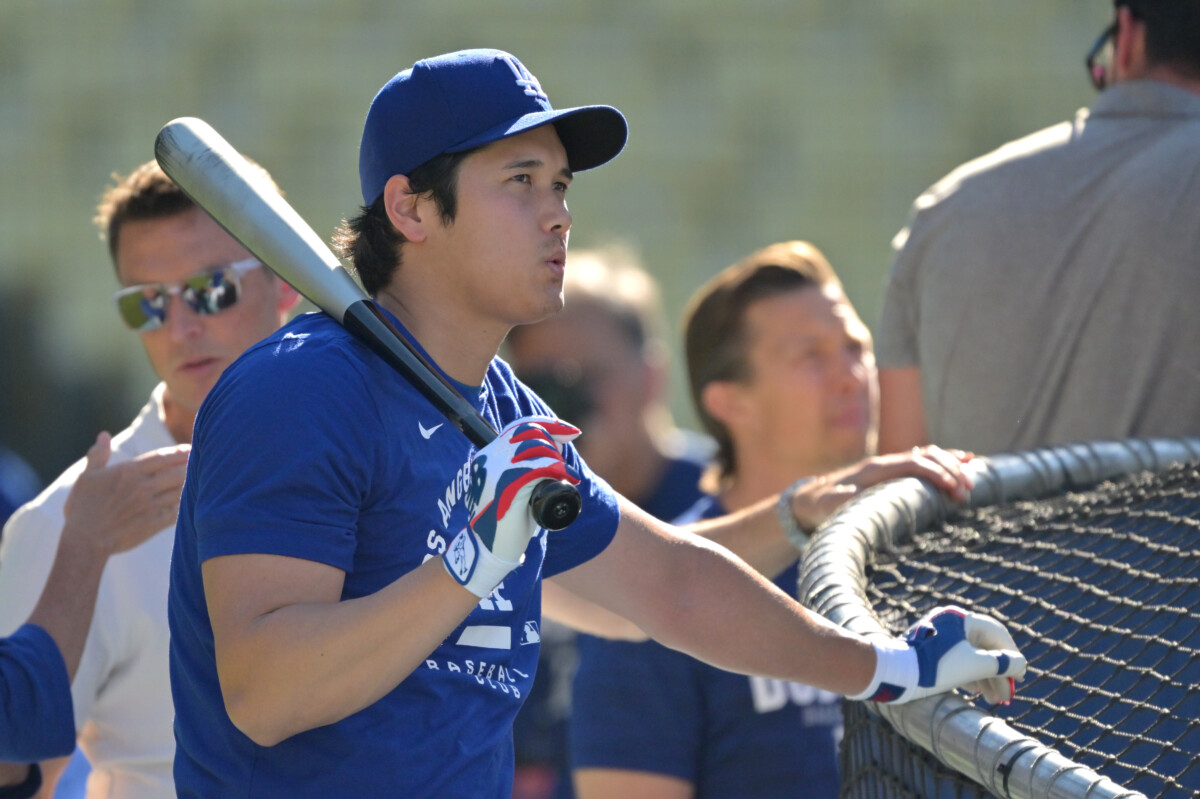 May 11, 2026; Los Angeles, California, USA;  Los Angeles Dodgers two-way player Shohei Ohtani (17) leans on the cage during batting practice prior to the game against the San Francisco Giants at Dodger Stadium. Mandatory Credit: Jayne Kamin-Oncea-Imagn Images