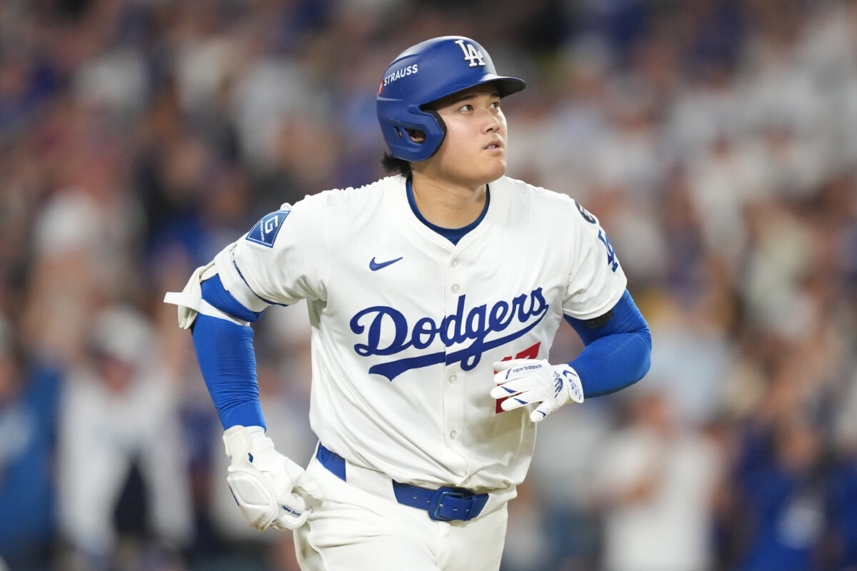 Oct 17, 2025; Los Angeles, California, USA; Los Angeles Dodgers two-way player Shohei Ohtani (17) runs after hitting a solo home run against the Milwaukee Brewers in the fourth inning during game four of the NLCS round for the 2025 MLB playoffs at Dodger Stadium. Mandatory Credit: Kirby Lee-Imagn Images