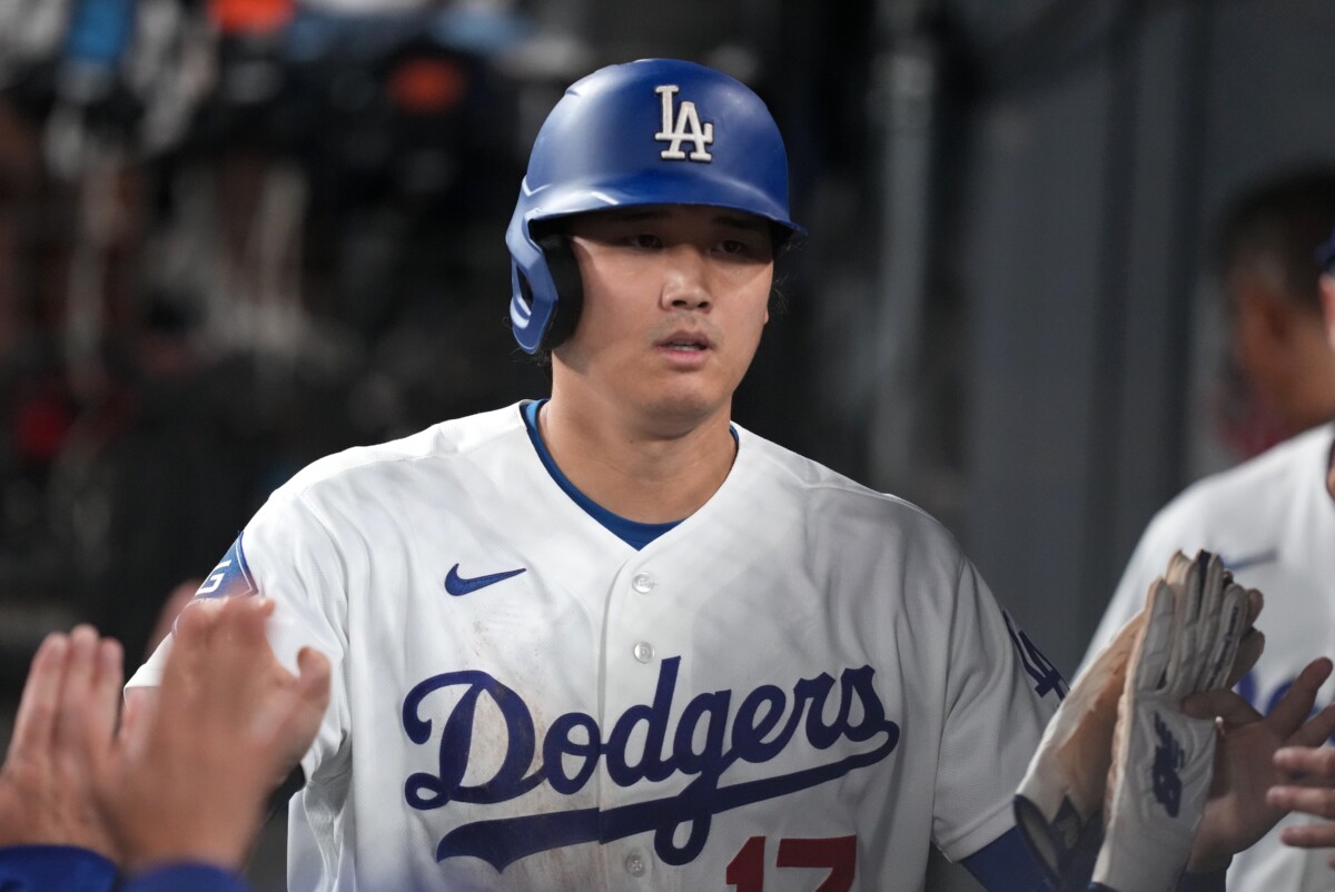 Sep 1, 2026; Los Angeles, California, USA; Los Angeles Dodgers pitcher Shohei Ohtani (17) celebrates in the dugout after scoring a run during the seventh inning against the St. Louis Cardinals at Dodger Stadium. Mandatory Credit: Kirby Lee-Imagn Images