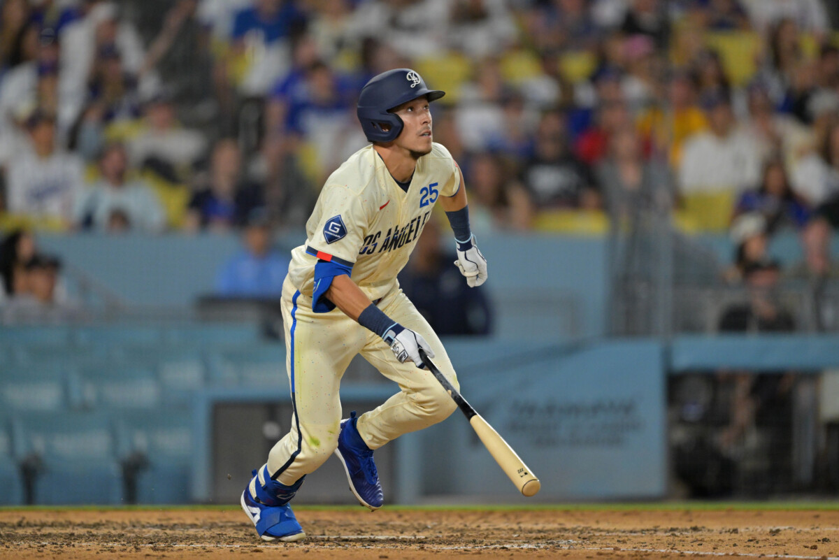 Sep 5, 2026; Los Angeles, California, USA; Los Angeles Dodgers second base Tommy Edman (25) hits a home run during the seventh inning against the Washington Nationals at UNIQLO Field at Dodger Stadium. Mandatory Credit: Jayne Kamin-Oncea-Imagn Images
