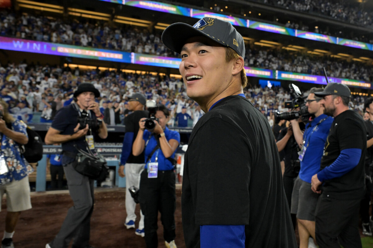 Oct 9, 2025; Los Angeles, California, USA; Los Angeles Dodgers pitcher Yoshinobu Yamamoto (18) on the field after defeating the Philadelphia Phillies in game four of the NLDS round for the 2025 MLB playoffs at Dodger Stadium. Mandatory Credit: Jayne Kamin-Oncea-Imagn Images