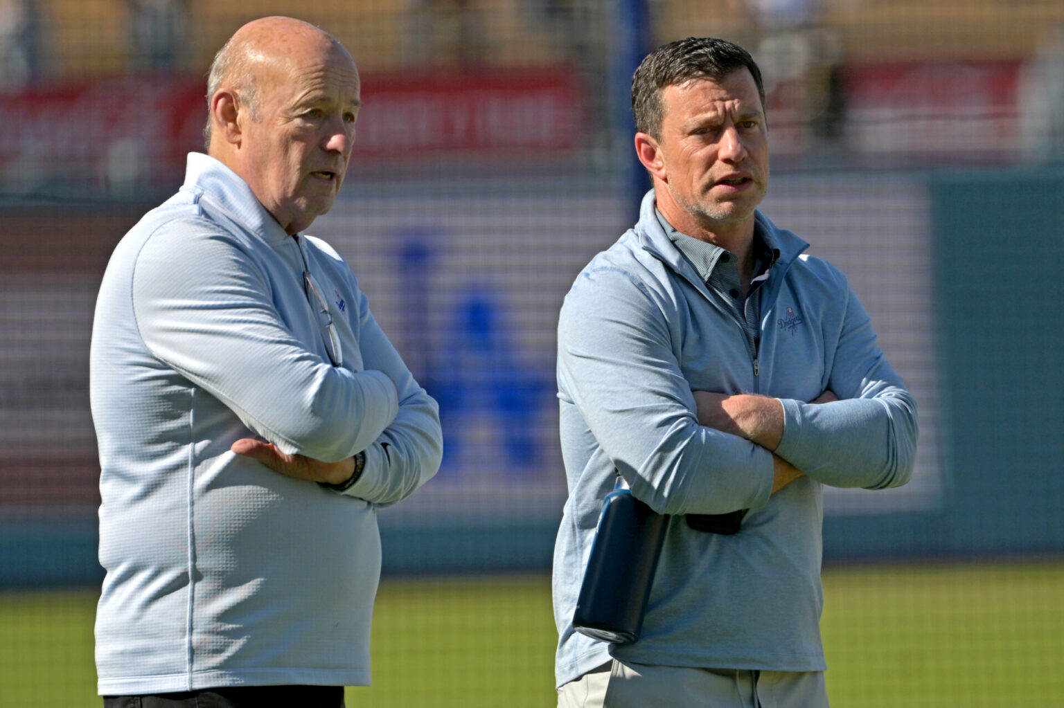 Apr 28, 2026; Los Angeles, California, USA; Los Angeles Dodgers President and CEO Stan Kasten talks with Andrew Friedman, President of Baseball Operations, prior to the game against the Miami Marlins at Dodger Stadium. Mandatory