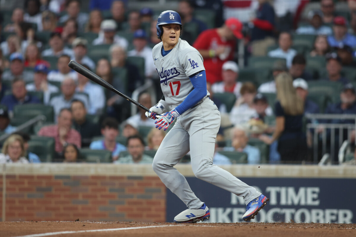 Oct 6, 2026; Cumberland, Georgia, USA; Los Angeles Dodgers two-way player Shohei Ohtani (17) reacts after catcher's interference during the third inning against the Atlanta Braves at Truist Park. Mandatory Credit: Brett Davis-Imagn Images
