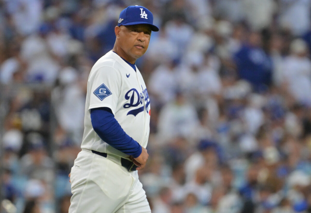 Oct 4, 2026; Los Angeles, California, USA; Los Angeles Dodgers manager Dave Roberts walks to the mound during the fourth inning against the Atlanta Braves in game two of the NLDS for the 2026 MLB Playoffs at Uniqlo Field at Dodger Stadium. Mandatory Credit: Jayne Kamin-Oncea-Imagn Images