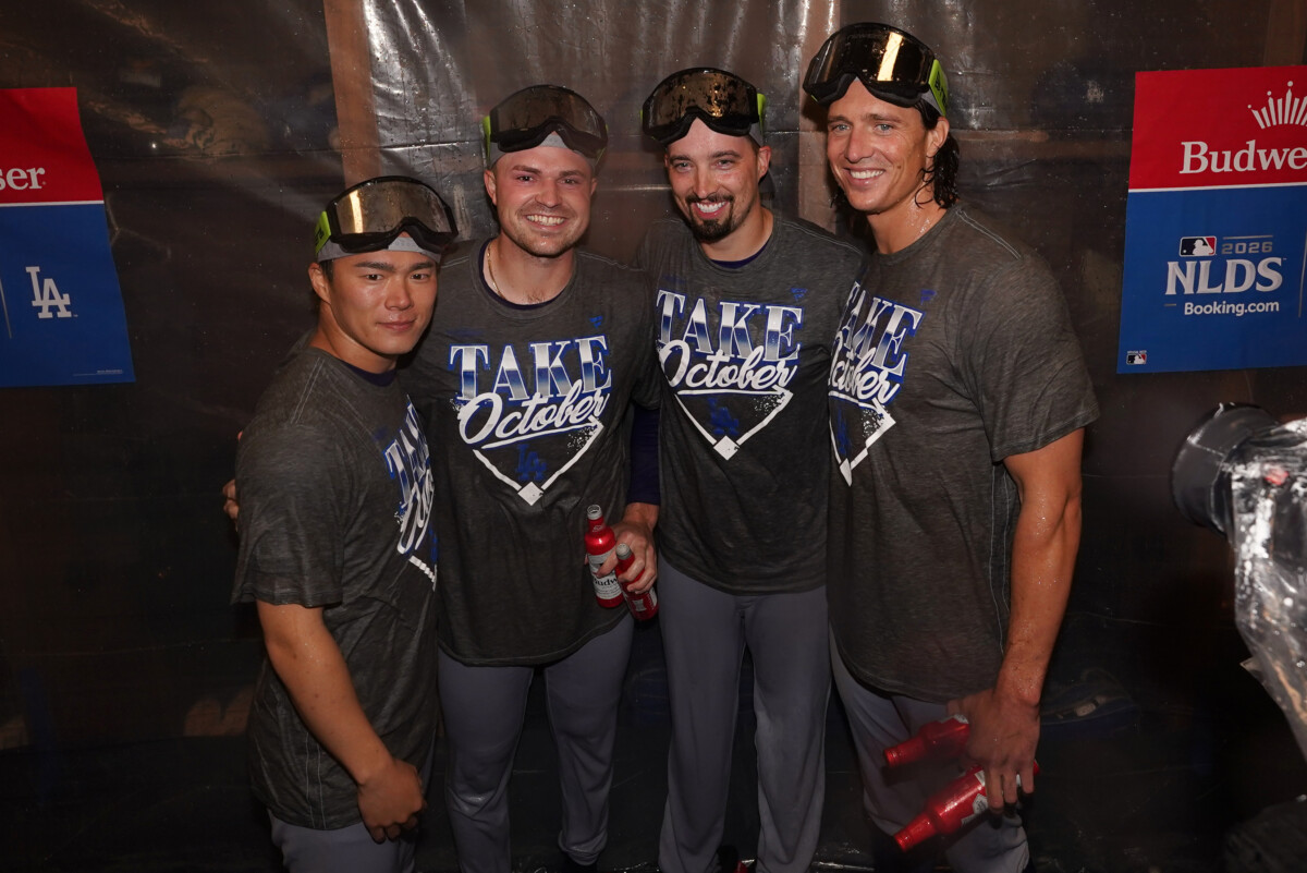 Oct 7, 2026; Cumberland, Georgia, USA;  Left to right: Los Angeles Dodgers pitcher Yoshinobu Yamamoto (18), pitcher Tarik Skubal (29), pitcher Blake Snell (7), and pitcher Tyler Glasnow (31), celebrate in the locker room after defeating the Atlanta Braves in game four of the NLDS for the 2026 MLB Playoffs at Truist Park.  Mandatory Credit: Dale Zanine-Imagn Images