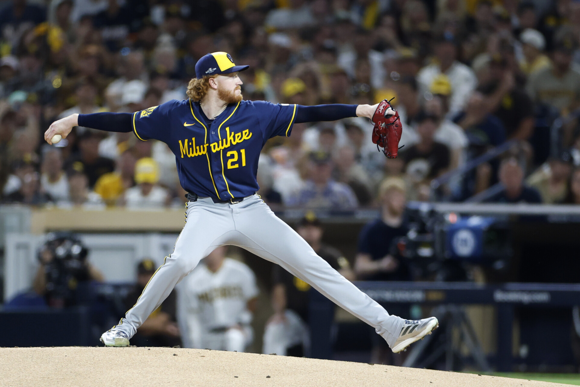 Oct 6, 2026; San Diego, California, USA;  Milwaukee Brewers pitcher Dustin May (21) pitches during the first inning against the San Diego Padres in game three of the NLDS for the 2026 MLB Playoffs at Petco Park.  Mandatory Credit: David Frerker-Imagn Images