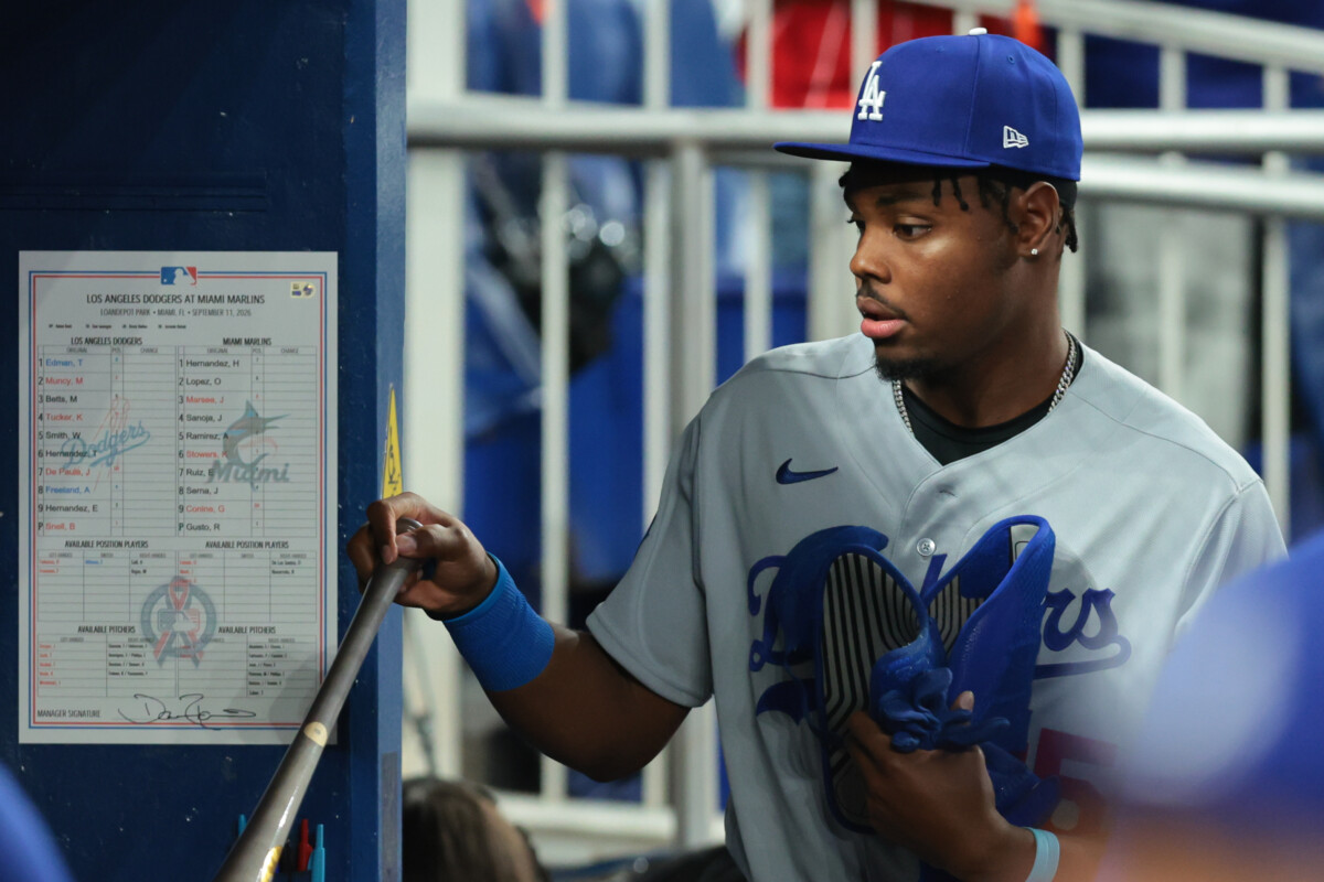 Sep 11, 2026; Miami, Florida, USA; Los Angeles Dodgers designated hitter Josue De Paula (95) arrives to the dugout before the game against the Miami Marlins at loanDepot Park. Mandatory Credit: Sam Navarro-Imagn Images