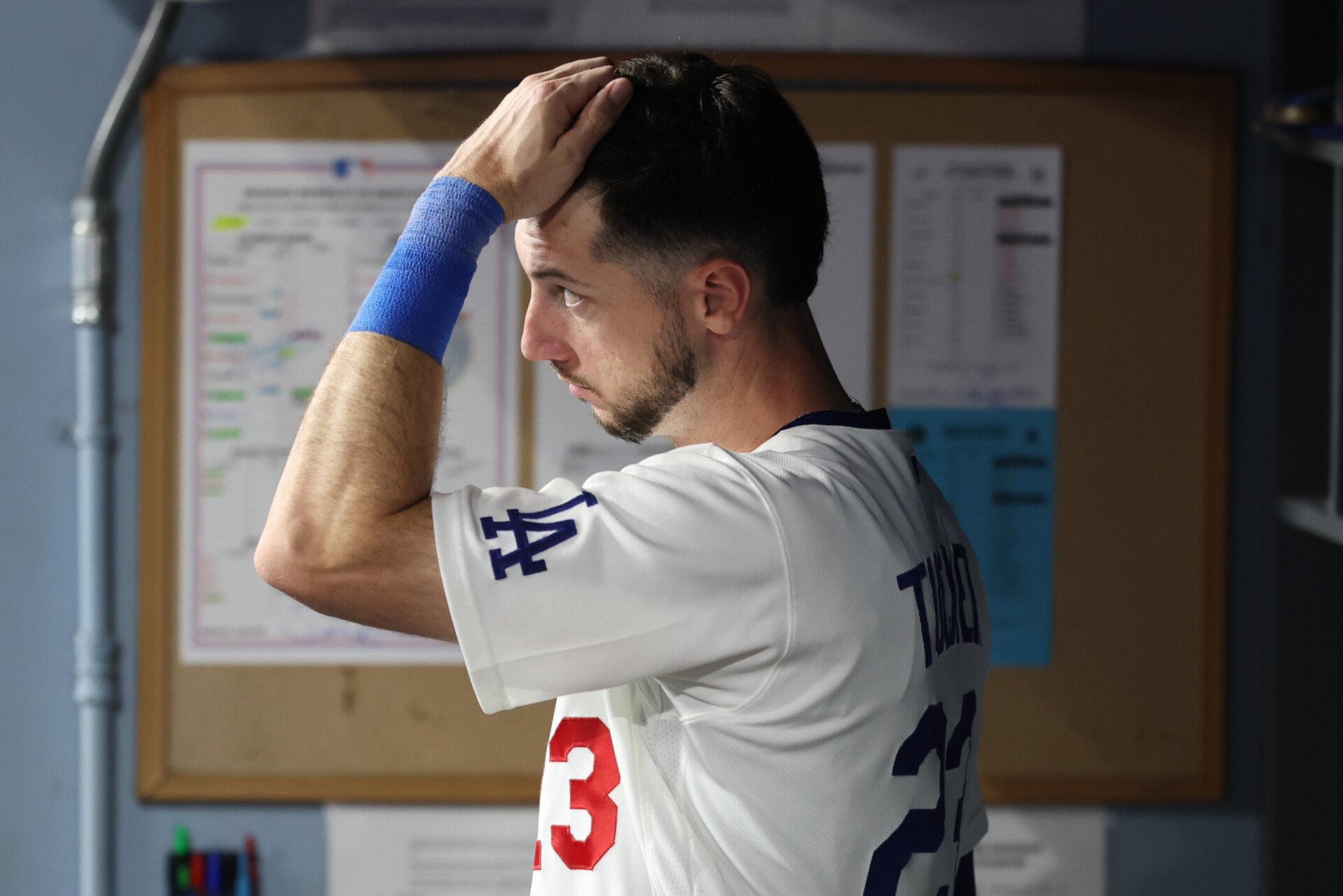 Oct 14, 2026; Los Angeles, California, USA; Los Angeles Dodgers outfielder Kyle Tucker (23) reacts in the dugout during the ninth inning against the Milwaukee Brewers in game three of the NLCS for the 2026 MLB Playoffs at Uniqlo Field at Dodger Stadium. Mandatory Credit: Kiyoshi Mio-Imagn Images