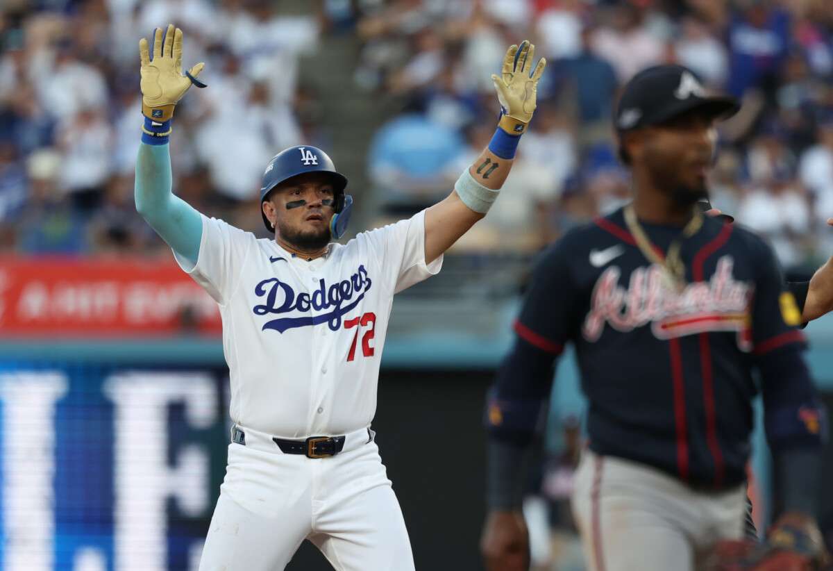 Oct 4, 2026; Los Angeles, California, USA; Los Angeles Dodgers second baseman Miguel Rojas (72) reacts after a double during the third inning against the Atlanta Braves in game two of the NLDS for the 2026 MLB Playoffs at Uniqlo Field at Dodger Stadium. Mandatory Credit: Kiyoshi Mio-Imagn Images