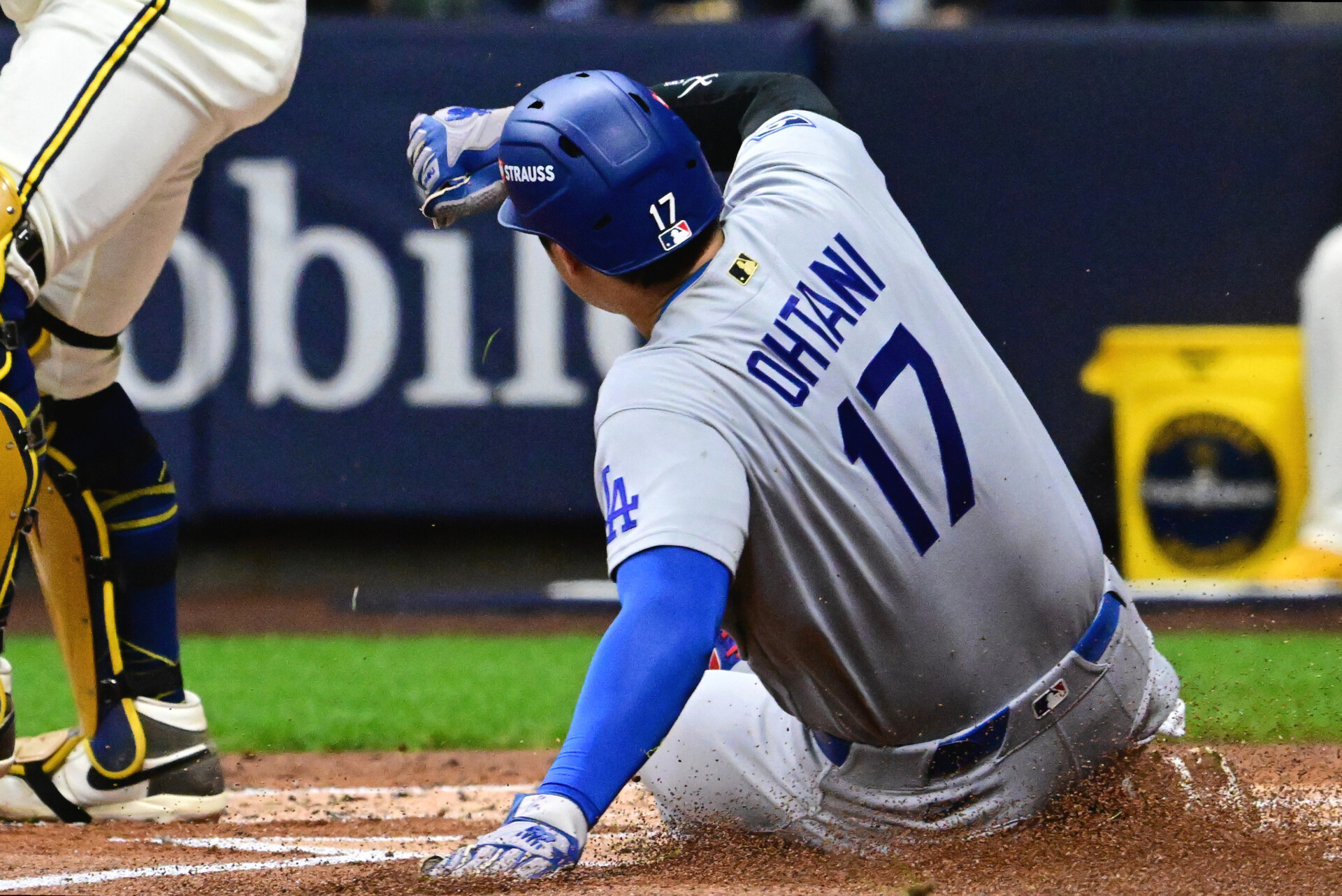 Oct 11, 2026; Milwaukee, Wisconsin, USA; Los Angeles Dodgers pitcher Shohei Ohtani (17) scores on an RBI single by outfielder Andy Pages (not pictured) during the second inning against the Milwaukee Brewers in game one of the NLCS for the 2026 MLB Playoffs at American Family Field. Mandatory Credit: Benny Sieu-Imagn Images