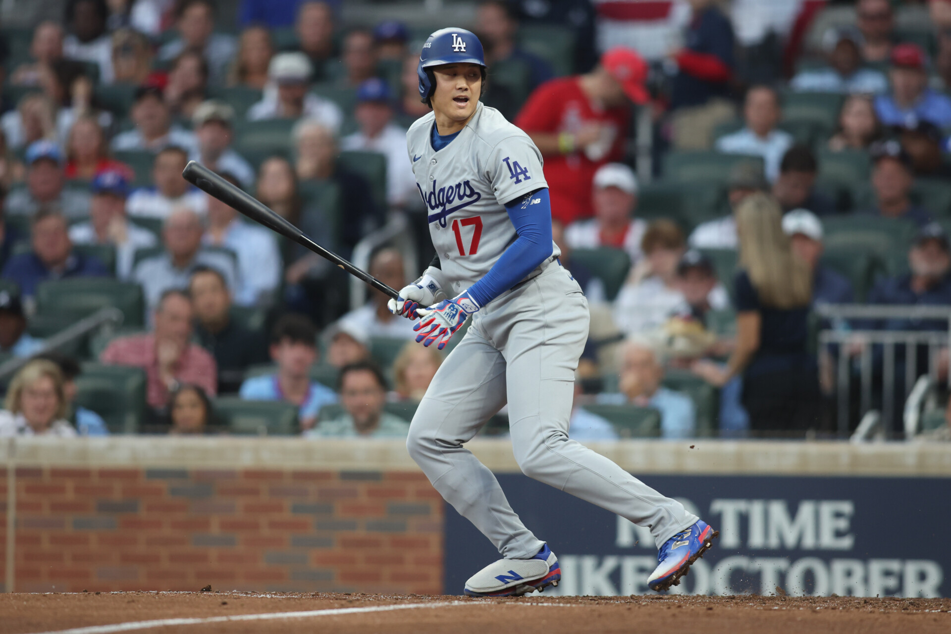 Oct 6, 2026; Cumberland, Georgia, USA;  Los Angeles Dodgers two-way player Shohei Ohtani (17) reacts after catcher's interference during the third inning against the Atlanta Braves at Truist Park.  Mandatory Credit: Brett Davis-Imagn Images