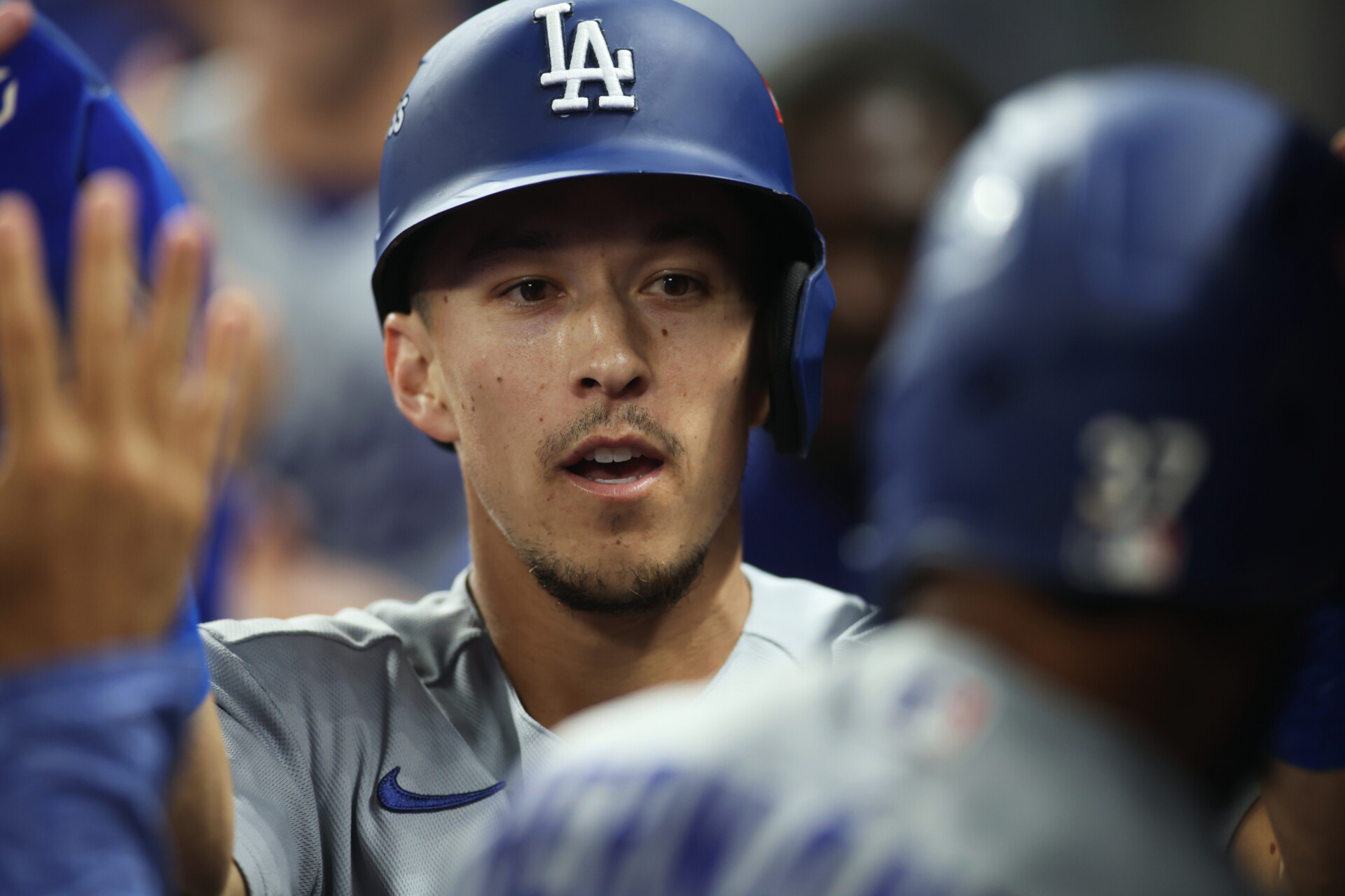 Oct 7, 2026; Cumberland, Georgia, USA;  Los Angeles Dodgers second baseman Tommy Edman (25) celebrates after scoring against the Atlanta Braves during the seventh inning in game four of the NLDS for the 2026 MLB Playoffs at Truist Park.  Mandatory Credit: Brett Davis-Imagn Images