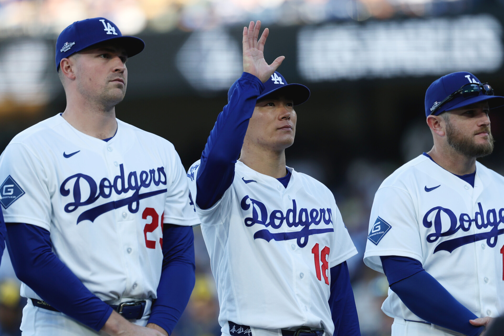 Oct 14, 2026; Los Angeles, California, USA; Los Angeles Dodgers pitcher Yoshinobu Yamamoto (18) waves during the pregame ceremony before game three of the NLCS for the 2026 MLB Playoffs against the Milwaukee Brewers at Uniqlo Field at Dodger Stadium. Mandatory Credit: Kiyoshi Mio-Imagn Images
